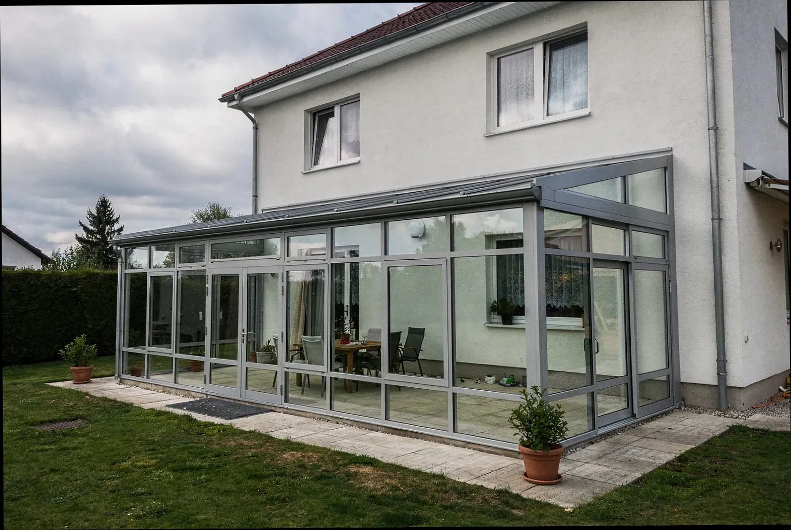 Glasanbau an einem Wohnhaus in Stutensee